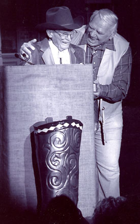 Director Earl Bellamy gets congratulations from pal Ernie Borgnine as Earl received his Golden Boot Award in 2002.