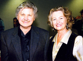 Golden Boot Award winner in 1996 Charles Bronson poses with photographer Kelo Henderson’s wife Gail.