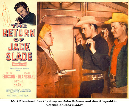 Mari Blanchard has the drop on John Ericson in "Return of Jack Slade".