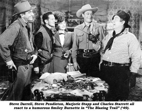 Steve Darrell, Steve Pendleton, Marjorie Stapp and Charles Starrett all react to a humorous Smiley Burnette in "The Blazing Trail" ('49).