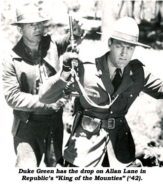 Duke Green has the drop on Allan Lane in Republic's "King of the Mounties" ('42).