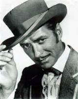 Yancy Derringer tips his hat.