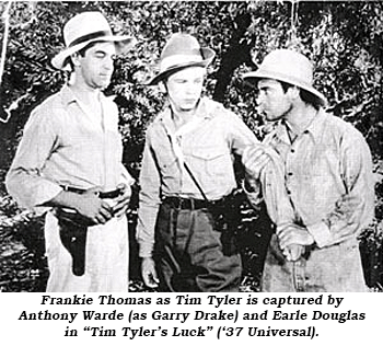 Frankie Thomas as Tim Tyler is captured by Anthony Warde (as Garry Drake) and Earle Douglas in "Tim Tyler's Luck" ('37 Universal).