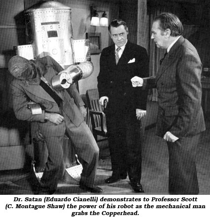 Dr. Satan (Eduardo Cianelli) demonstrates to Professor Scott (C. Montague Shaw) the power of his robot as the mechanical man grabs the Copperhead.