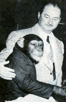 Columbia serial producer Sam Katzman with Tamba the chimp in December 1952.