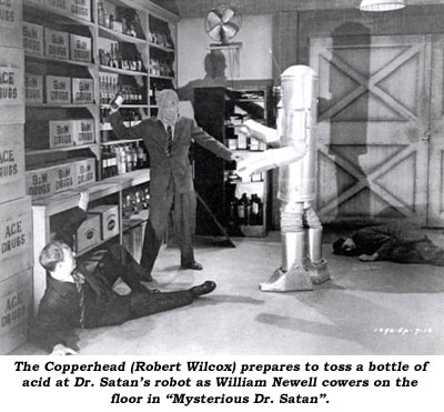 The Copperhead (Robert Wilcox) prepares to toss a bottle of acid at Dr. Satan's robot as William Newell cowers on the floor in "Mysterious Dr. Satan".