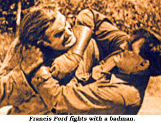 Francis Ford fights with a badman in a scene from "Another Man's Boots".