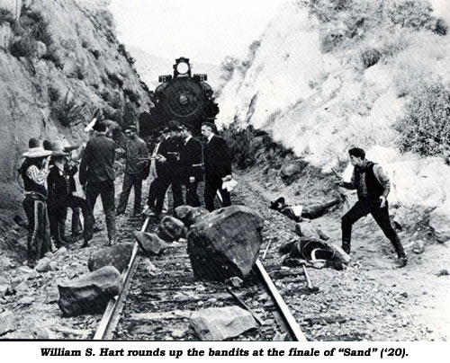 William S. Hart rounds up the bandits at the finale of "Sand" ('20).