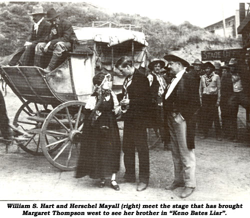 William S. Hart and Herschel Mayall (right) meet the stage that has brought Margaret Thompson west to see her brother in "Keno Bates Lirar".