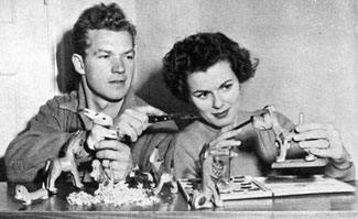 Bill (“Kit Carson”) Williams and wife Barbara Hale create their own Yuletide gifts. Bill carves minature animals and Barbara adds the paint job. (Photo circa 1949.) 