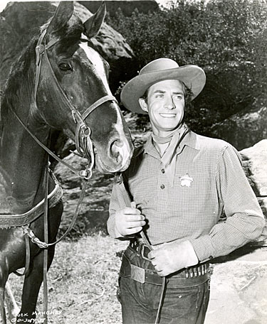 Jock Mahoney in Charles Starrett’s “Hawk of Wild River” (‘52 Columbia).