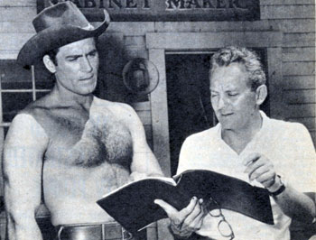 Clint Walker and director Walter Doniger go over the script for another episode of “Cheyenne”. 