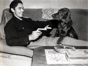 “Judge Roy Bean”—Jack Beutel at home with a book and his best friend. 