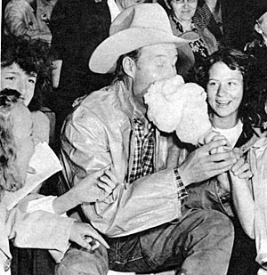 Bill and his fans enjoy some cotton candy. 