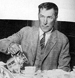 William S. Hart pours himself a cup of coffee at a New York hotel in 1936. 