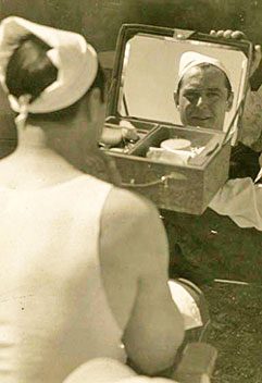 Ken Maynard applies his own make-up on location for another of his great Westerns.
(We are currently the proud owners of that exact make-up kit.)