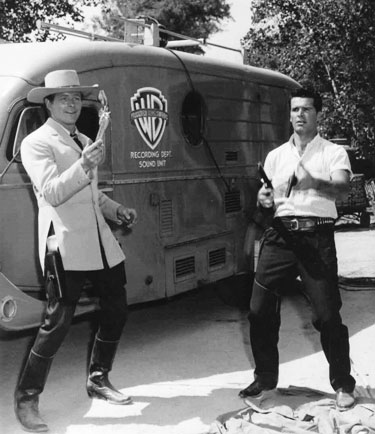 Wayde Preston (“Colt .45”) and James Garner (“Maverick”) practice their gun handling technique. (Thanx to Terry Cutts.) 