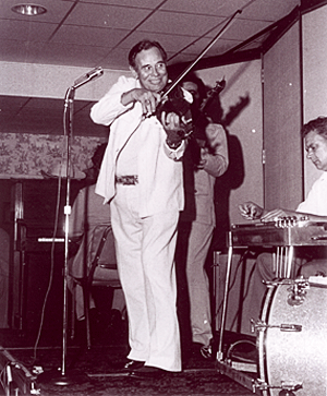 Art Davis entertains at a Western film festival. 