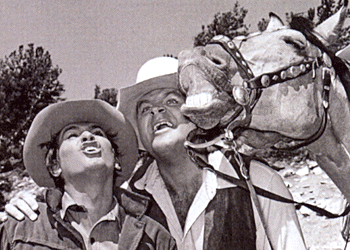 Horsin’ around with “Bonanza”’s Michael Landon and Dan Blocker. 