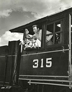 Audie Murphy with his sons Terry and James. 