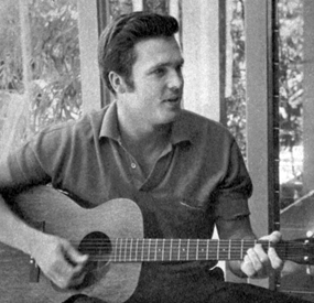 Ty "Bronco" Hardin tries harder practicing guitar in 1960.