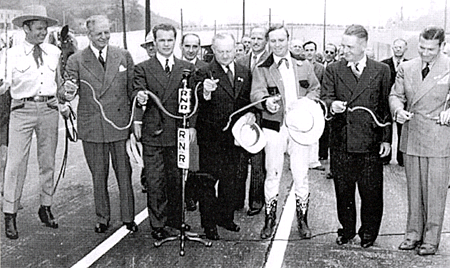 Dedication of the Cahuenga Pass freeway in 1940. (L-R) Tom Keene, honorary mayor of Sherman Oaks; Governor Culbert Olson; John Kingsley, President of the Hollywood Chamber of Commerce; L.A. Mayor Fletcher Bowron; Gene Autry, honorary mayor of North Hollywood; Burbank Mayor Frank Tillson and Richard Arlen, honorary mayor of Sunland. 