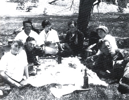 Silent stars Helen Holmes and Leo Maloney (center) circa 1915 during a lunch break while filming a chapter of Holmes’ “Hazards of Helen” Kalem serial.