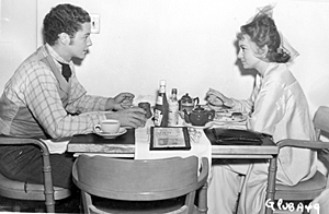 Tim Holt and Ann Shirley lunch together in the RKO commissary.