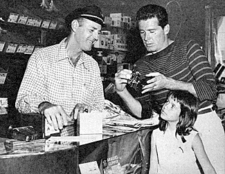 James "Maverick" Garner never lacks a fishing partner...stepdaughter Kim's
with him this time at the bait shop. 