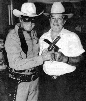 The Lone Ranger crosses guns with singer Ralph Spicer of Greenville, SC.