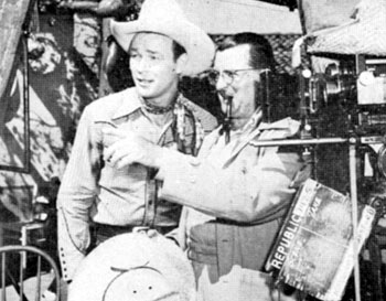 Director Frank McDonald discusses the next scene of “Along the Navajo Trail” (‘45) with Roy Rogers.