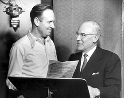 Gene Autry with (I believe) Art Satherly at a 1950 Columbia recording session. (Thanx to Bobby Copeland.)