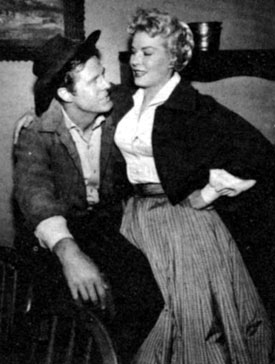 Robert Culp, Hoby Gilman on “Trackdown”, takes a break with leading lady Jeanne Willes.