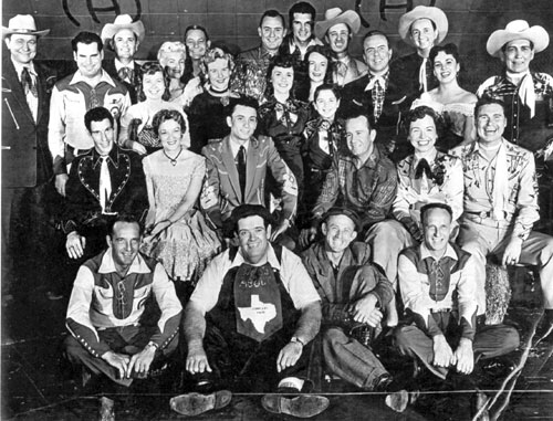 The cast of TV’s “Town Hall Party” aka “Ranch Party”. (Top row L-R): Tex Ritter, Jim Pruitt, Merle Travis, Fiddlin’ Kate, Buddy Dooly, Wesley Tuttle, Roy Klein, Joe Maphis, Johnny Bond. (Second row L-R): Shirley Adams, Marilyn Tuttle, Laurie Collins, Tommy Collins, Rose Maphis, Jay Steward, Mary Jane Johnson, Tex Harmon. (Third row L-R): Freddie Hart, Mary Lou Brunell, Bobby Charles, Skeets McDonald, Marion Hall. (Fourth row L-R): Billy Hill, Texas Tiny, Turnip Snodgrass, Pee Wee Adams. (Thanx to Dave Owens.)