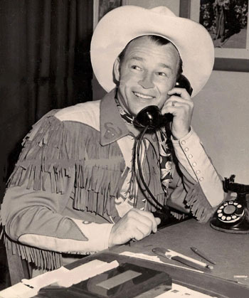 Roy Rogers conducts a little business on the phone. (Thanx to Jerry Whittington.)