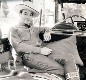 Tom Mix seems very relaxed in one of his automobiles, circa late ‘30s?