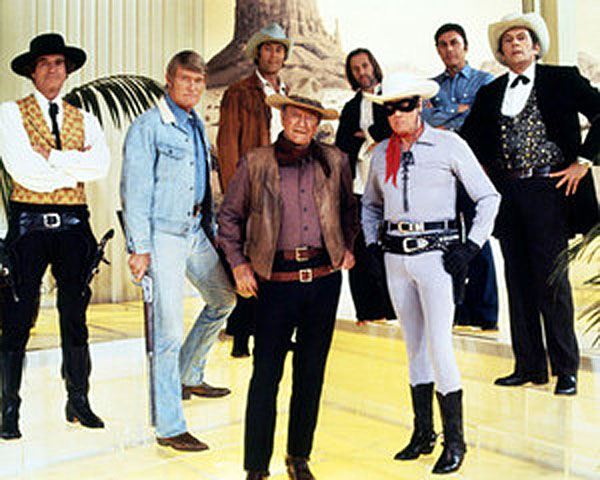 A classic photo from ABC’s 25th anniversary show on February 5, 1978. (L-R) Hugh O'Brian (“Wyatt Earp”), Chuck Connors (“The Rifleman”), Clint Walker (“Cheyenne”), John Wayne, David Carradine (“Kung Fu”), Clayton Moore (“The Lone Ranger”), Michael Ansara (“Broken Arrow”), Jack Kelly (“Maverick”).