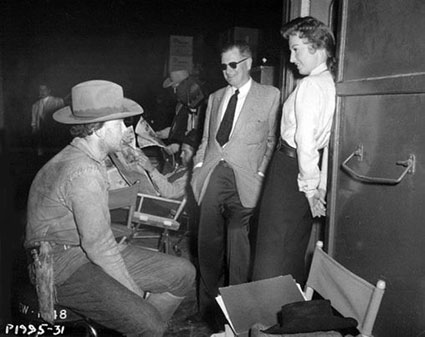 Scott Brady and Barbara Stanwyck talk with director Joe Kane on the set of Republic’s “Maverick Queen” (‘56). (Thanx to Bobby Copeland.)