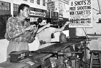 Before heading for some target practice fun at Ocean Park Pier (below) in early 1951, “U. S. Marshal” John Bromfield and his wife at the time Corinne Calvet stop for lunch at the popular Fox and Hounds restaurant.