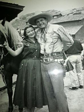 At Corriganville, Ray “Crash” Corrigan gets a hug from an adoring fan.