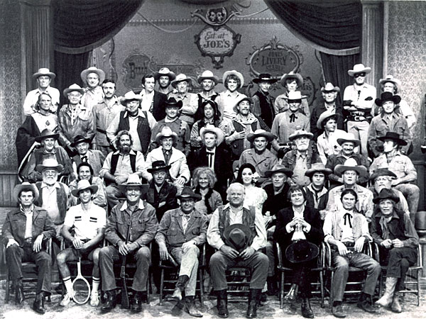 Group photo taken for the 1978 TV special “When the West Was Fun”. (L-R front row): Dewey Martin, Johnny Crawford, Chuck Connors, host Glenn Ford, Alan Hale Jr., Henry Darrow, Larry Storch, Neville Brand. (L-R second row): Denver Plye, Iron Eyes Cody, Harry Lauter, Jeanette Nolan, Linda Cristal, John Ireland, Darby Hinton, Joe Bowman, Fred Putnam. (L-R third row): Pat Buttram, Milburn Stone, Dan Haggerty, Guy Madison, Rex Allen, John Bromfield, Keenan Wynn, Jackie Coogan, George Montgomery. (L-R fourth row): X Brands, Bill Williams, Michael Ansara, Slim Pickens, Dick Jones, Don Diamond, Ken Curtis, John Russell, Peter Brown, James Drury. (L-R fifth row): Rod Cameron, Jock Mahoney, Jack Kelly, Tony Young, John McIntire, Ty Hardin, Mark Slade, Lee Van Cleef, Will Hutchins, Terry Wilson, Clayton Moore, Doug McClure. (8x10 glossy copies of this photo available for $6. plus $3 postage.)