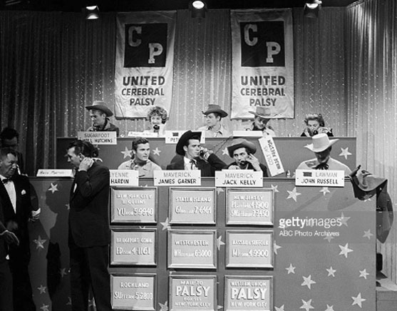 In October 1958 seven Warner Bros. TV heroes guested on Pat Boone’s TV show in New York City. Afterward all seven helped man the phones at a Cerebral Palsy Telethon. L-R top row: Will “Sugarfoot” Hutchins, Peter “Lawman” Brown, Wayde “Colt .45” Preston. Bottom Row L-R: Ty “Bronco” Hardin, James “Maverick” Garner, Jack “Maverick” Kelly, John “Lawman” Russell. The MC left of Hardin is Dennis James.